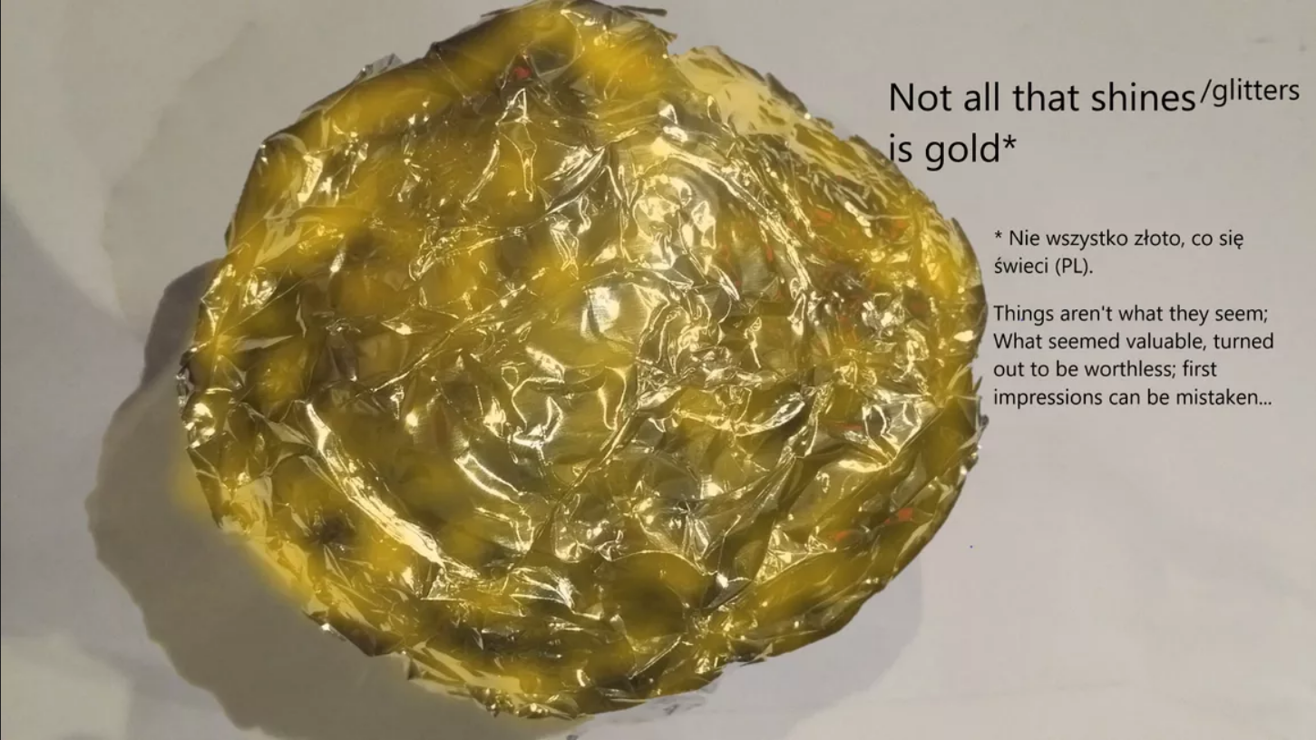 A green crinkly shape with text : Not all that lgitters is gold